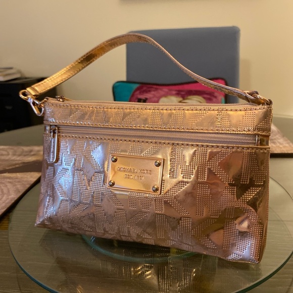 Michael Kors Handbags - Michael Kors Gold Clutch with Leather Accents